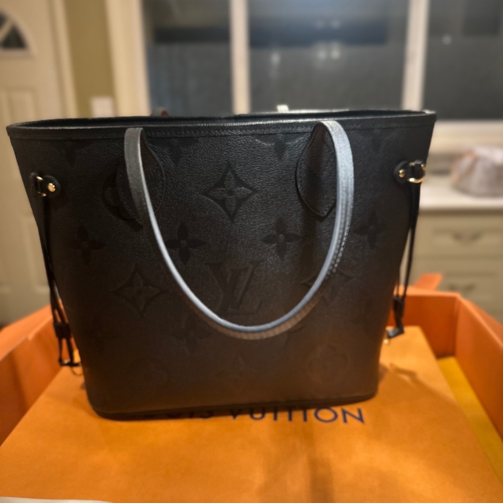 Genuine Louis Vuitton Never Full MM
